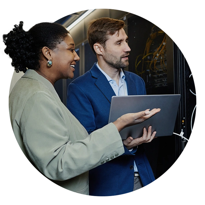IT collaborators working in server room